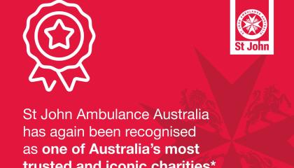 A red graphic with the SJQ logo and white text that says 'St John Ambulance Australia has again been recognised as one of Australia's most trusted and iconic charities'.