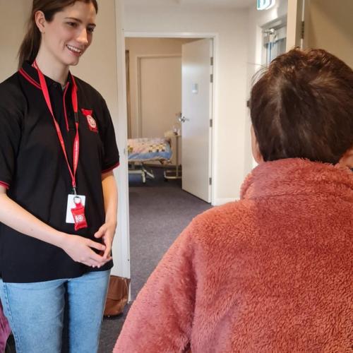 An image of SJQ volunteer - Kate - with client Keiko.