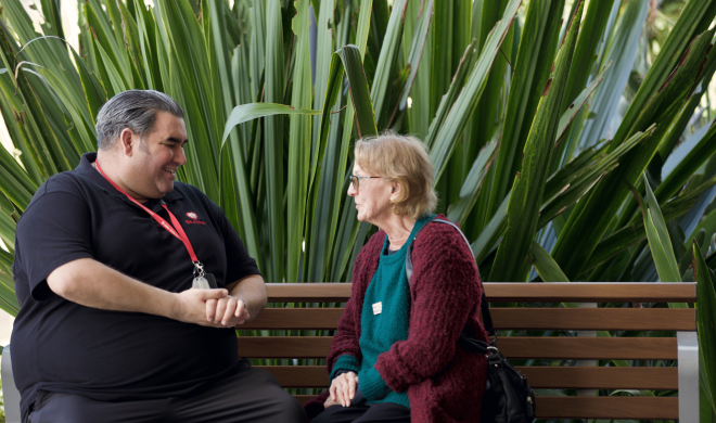 St Johns worker chatting to elderly lady