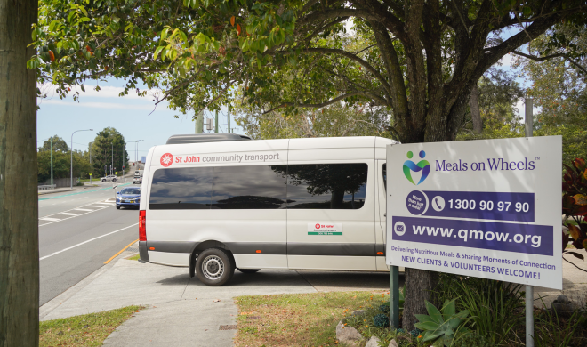 An image of the St Johns QLD community transport van pulling into the BNE Meals on Wheels facility.