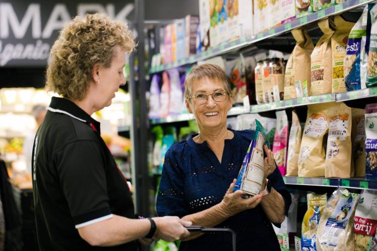 St Johns worker assisting a client with a social outing