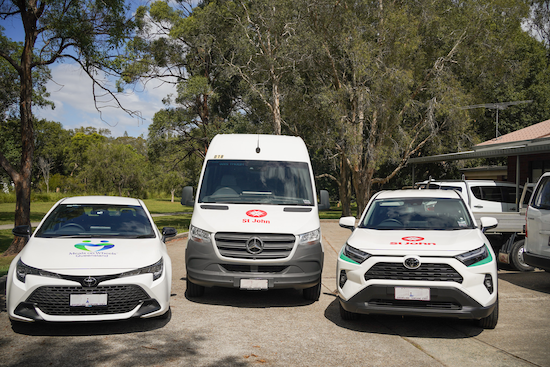 An image of the Community Transport van and two Meals on Wheels cars.