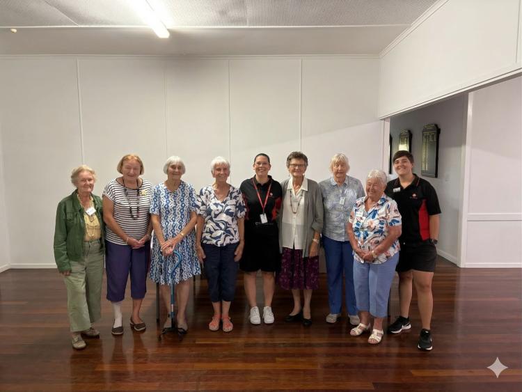 A group shot of several people involved in a recent group social trip.